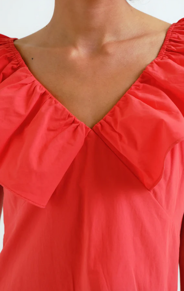 Abito rosso con ruches